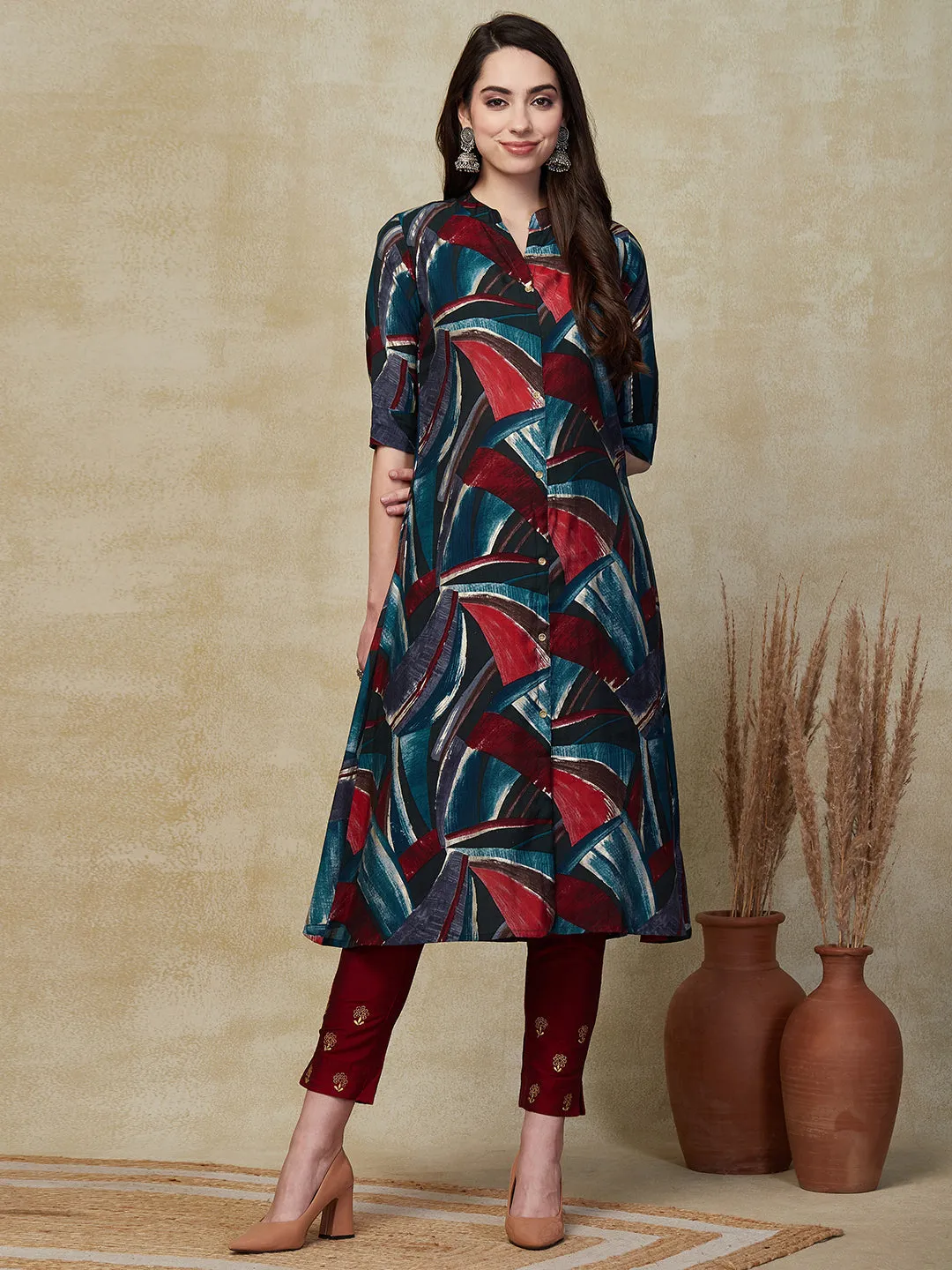 Abstract Printed Golden Buttons Embellished A-line Kurta - Multi & Blue